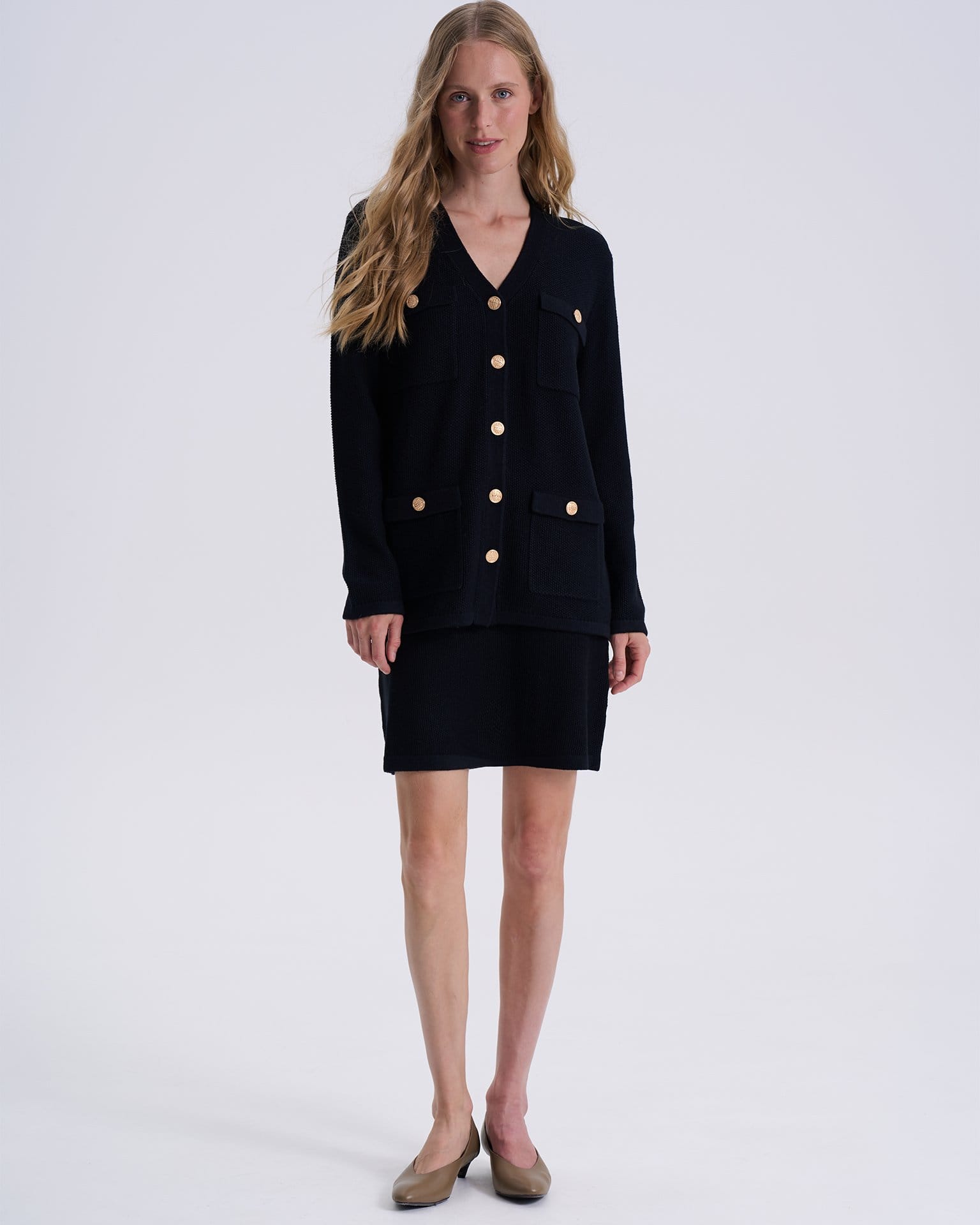 Вязаная юбка средней длины