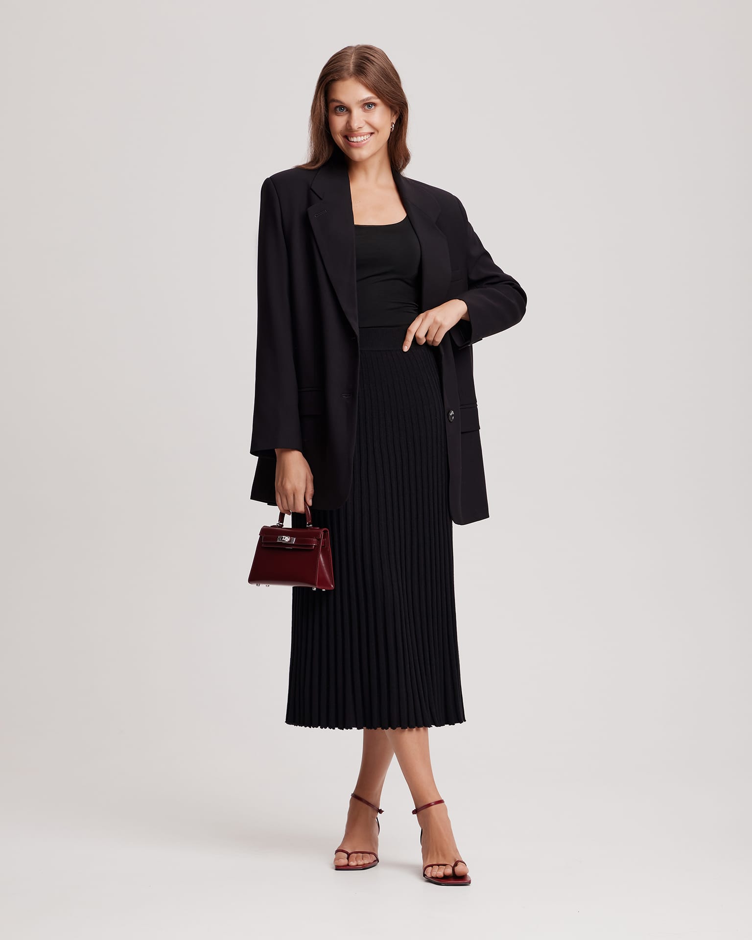 Плиссированая юбка-миди в черном цвете