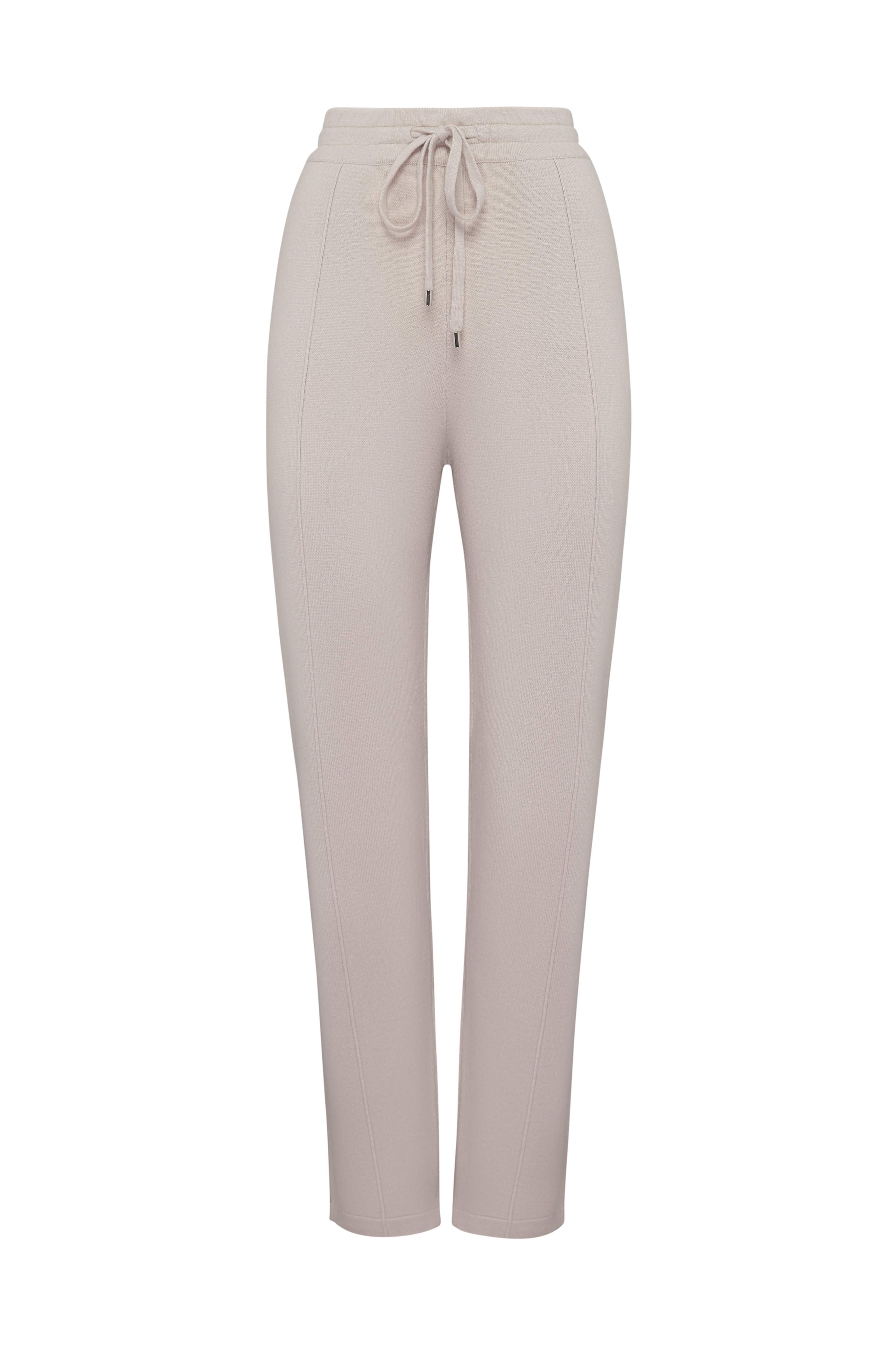 Зауженные брюки на резинке в бежевом цвете