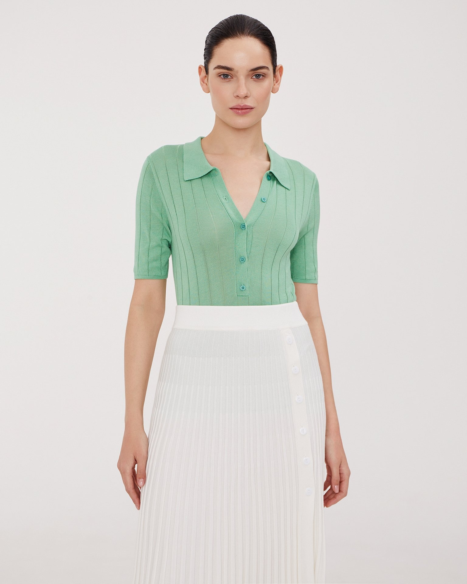 Поло зеленого цвета